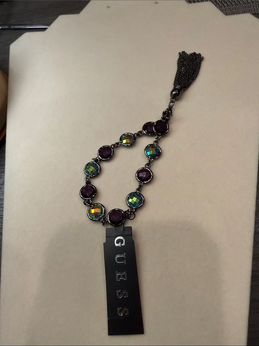 GUESS Purple and Iridescent Stone Bracelet with Gunmetal Tassel